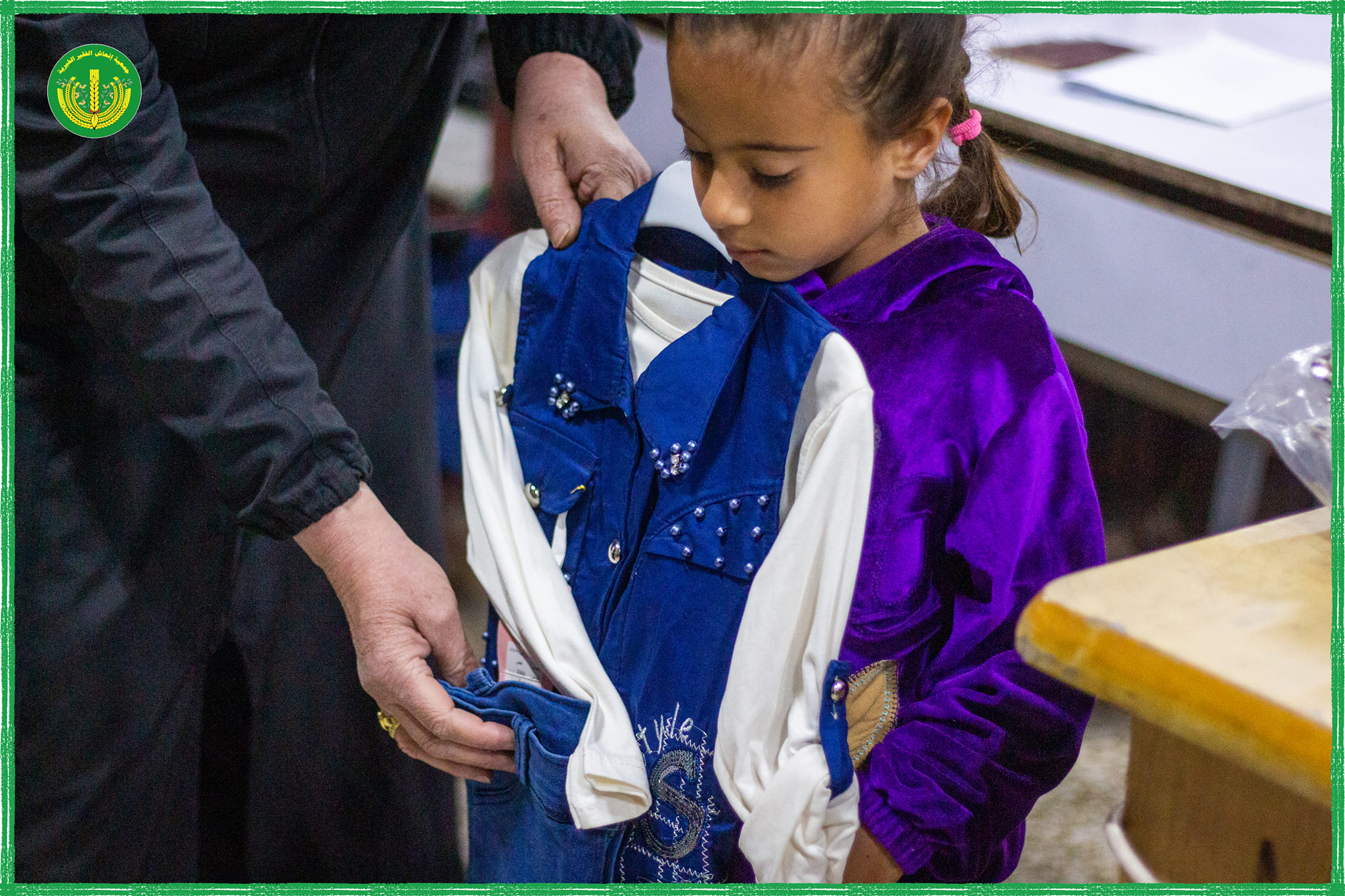 توزيع ملابس جديدة على المدرجين الفقراء والأيتام والمساكين